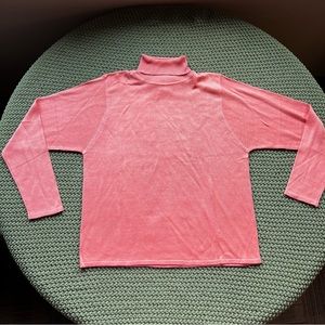 Vintage woman’s 100% silk turtleneck by Herman Geist
